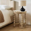 Tavolino in stile rustico con piano effetto marmo e gambe tornite